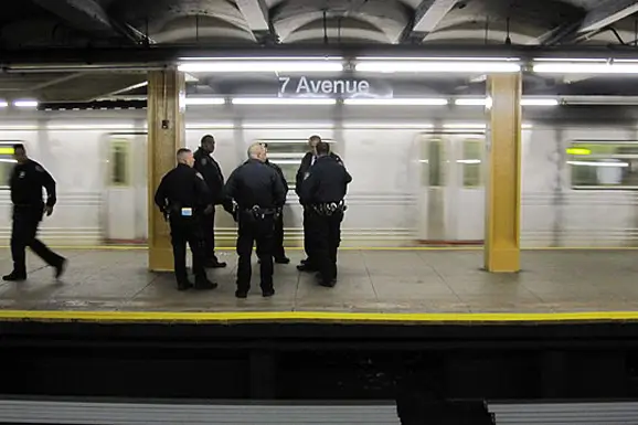 Photograph of police at 7th Avenue station by Erik Olson